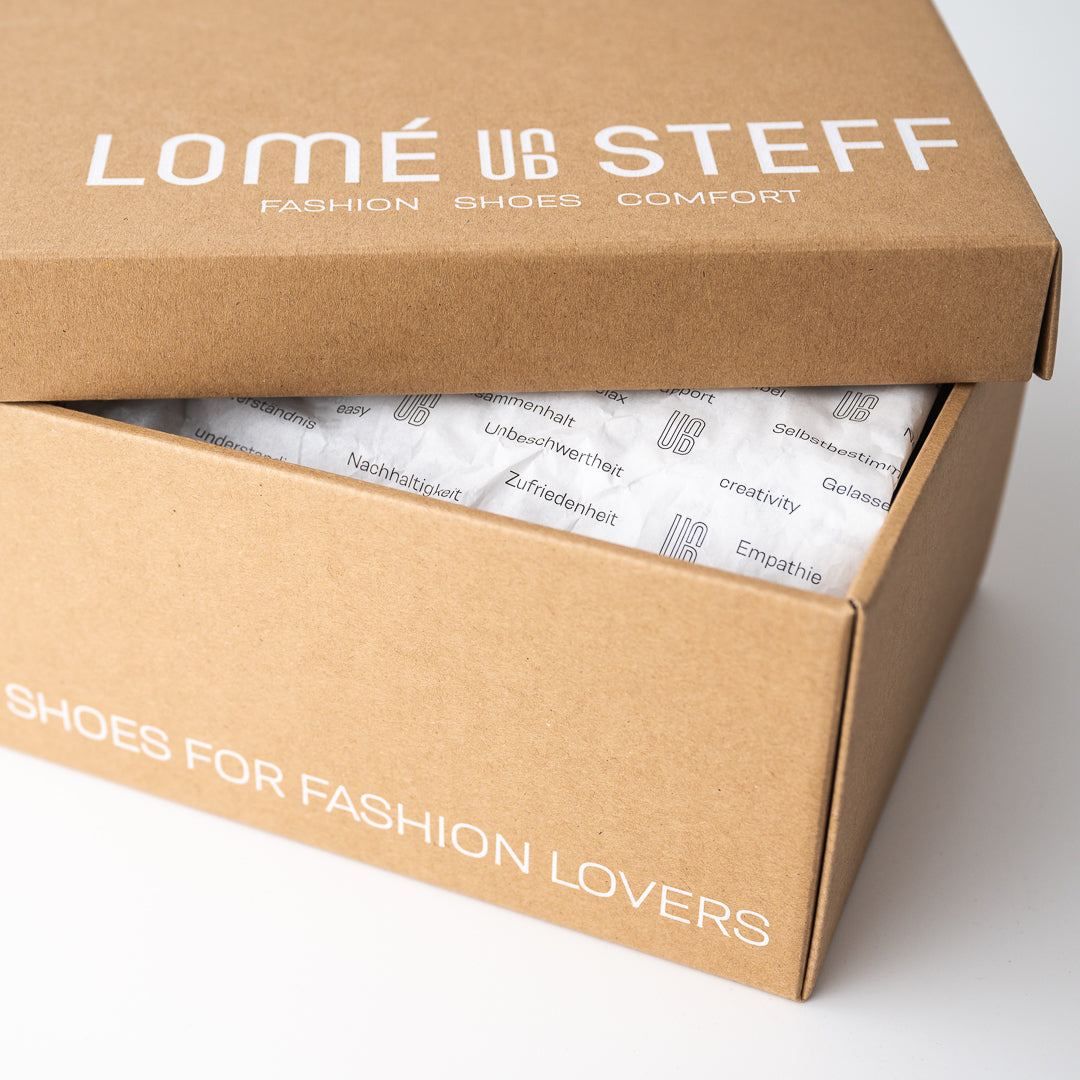 imini Karton Lomé und Steff Shoe Shop